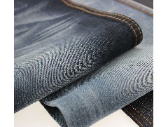 彈力牛仔布廠：牛仔褲具體的重量常見是多少？